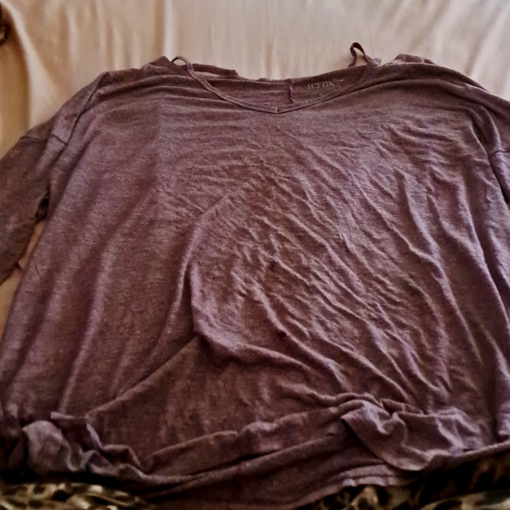 A purplish pink short sleeve shirt